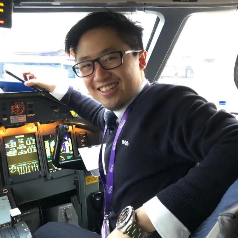 Lok Hei Justin Law in an aircraft cockpit